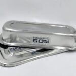 Medical grade stainless steel surgical instrument trays stacked with lids