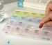 Weekly pill organizer box