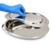 Close-up of stainless steel female bedpan with lid and handle
